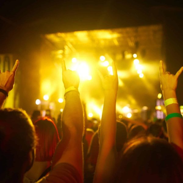 excited-crowd-at-rock-concert-with-stage-lights-2026-03-19-10-22-36-utc (1)